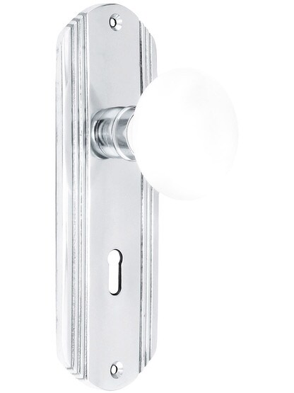 Streamline Moderne Mortise Lock Set With White Porcelain Door Knobs in Polished Chrome.